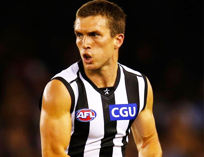 Clinton Young sends Collingwood into attack during its round one NAB Cup victory over Essendon on Friday night.